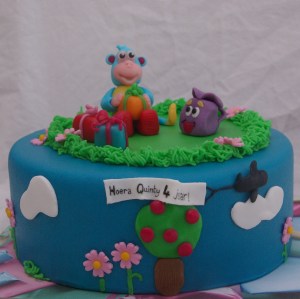 dora taart met boots en rugzak